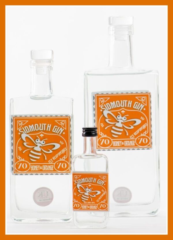 honey and orange Sidmouth gin bottles