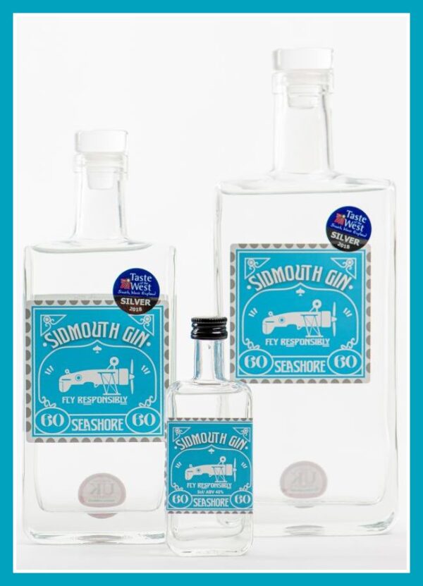 Sidmouth gin bottles - sea shore